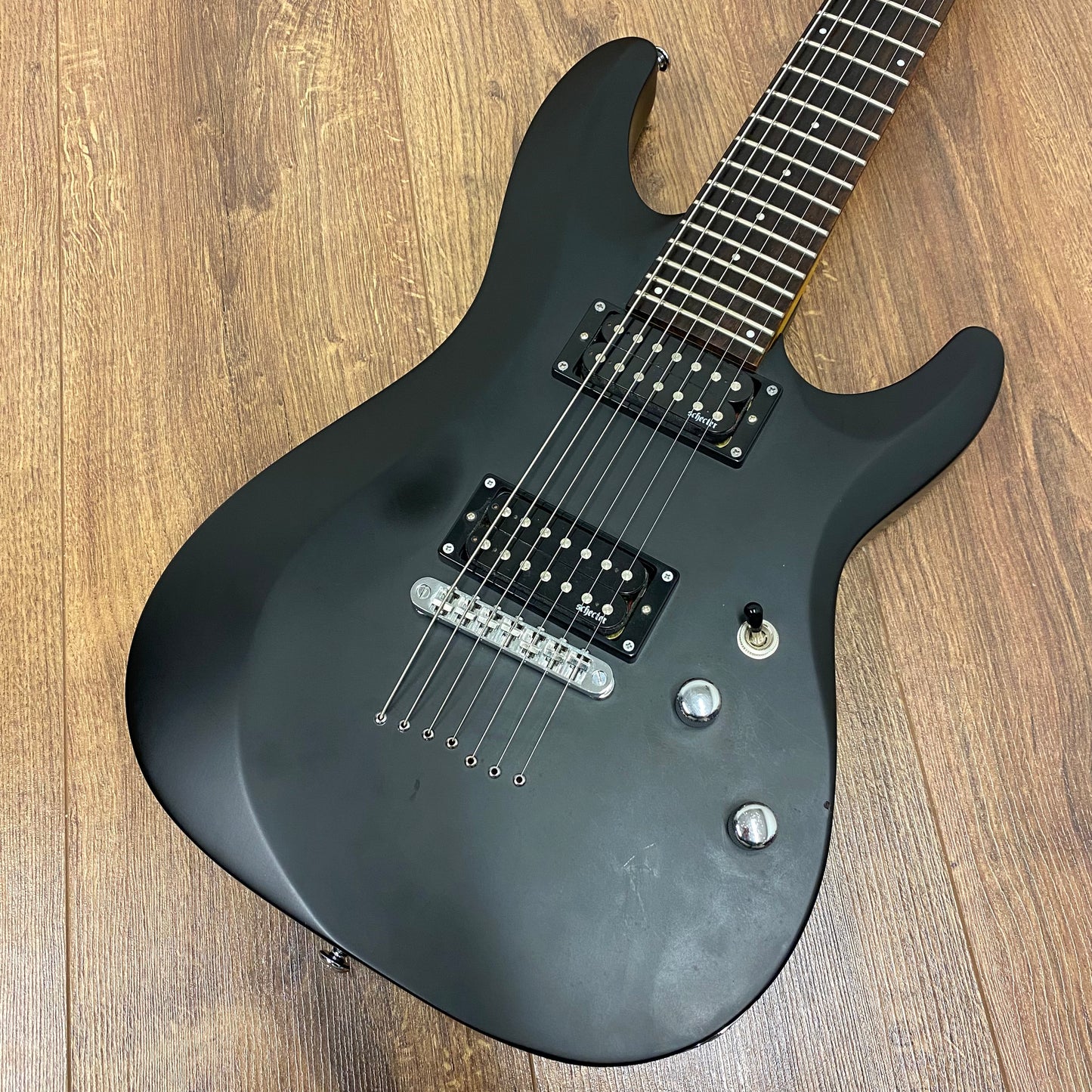 Pre-Owned Schecter C-7 Deluxe 7-String - Satin Black